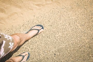 Beautiful traces with feet on sea nature background