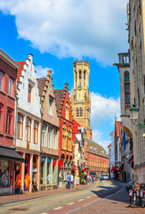 Naklejka premium Beautiful narrow streets and traditional houses in the old town of Bruges (Brugge), Belgium