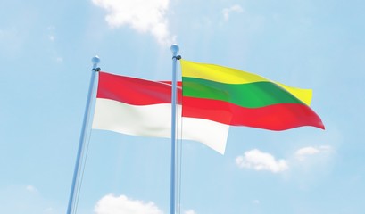 Lithuania and Indonesia, two flags waving against blue sky. 3d image