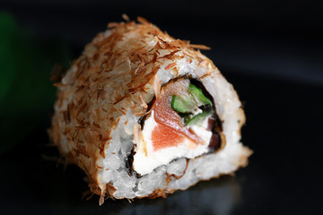 Tasty sushi roll on plate, closeup