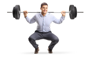 Young man in formal clothes lifting weights