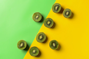 Tasty sliced kiwi on color background