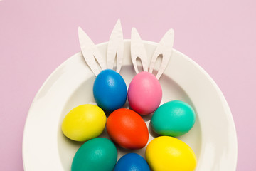easter eggs on pink background