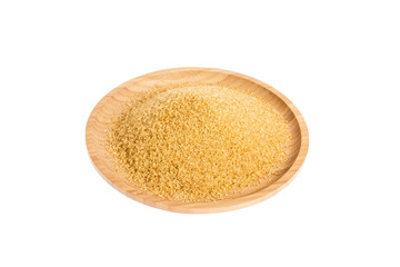 wooden dish with brown sugar on white background