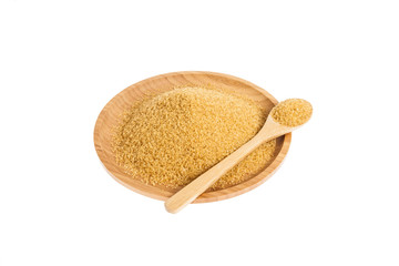 wooden dish with brown sugar on white background