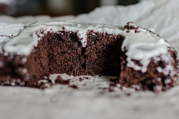 Close up of chocolate pie with flowing cream