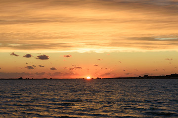 The setting sun on the estuary.