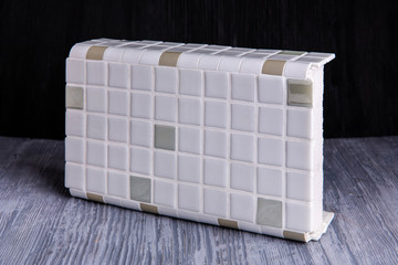 A white opaque angular tile for bathrooms and kitchen