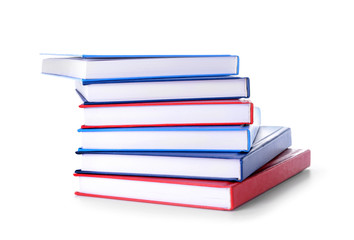 Stack of books on white background