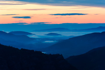 Fototapeta na wymiar Foggy sunrise over Rodopi mountain, Bulgaria. Mountain landscape