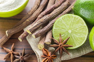 licorice root, lemon and anise on the table