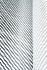 White carbon fiber composite material close up view
