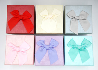 Six gift boxes of different colours 