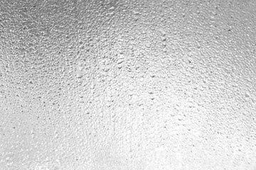 water dew drop on mirror of car, Monochrome style (black and white color) for background, look feeling sad