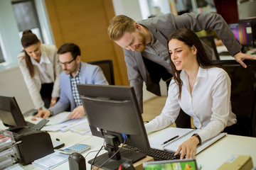 Naklejka premium Young people working in the office