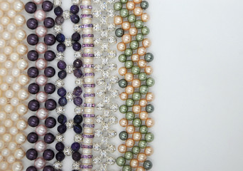 beaded jewellery items on the white background