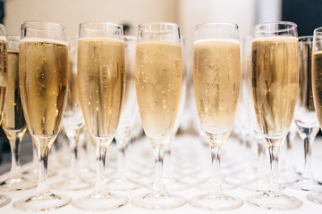 Glasses of fresh champagne with bubbles