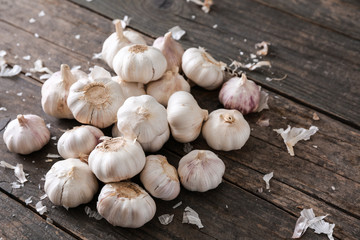 Fresh garlic on wooden background
