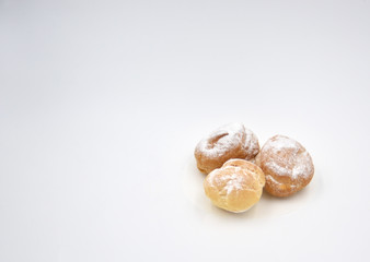 Isolated pastry with cream and sugar dust