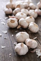 Fresh garlic on wooden background