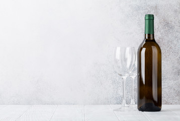 White wine bottle and glasses