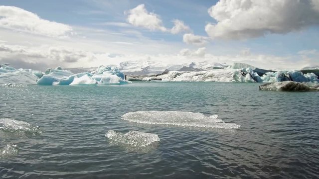 Floating icebergs in J&ouml;kuls&aacute;rl&oacute;n glacial lagoon at Iceland. Thaw effect at glacial