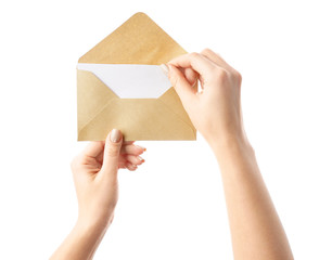 Female hands with envelope on white background