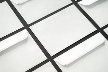 Many blank envelopes on dark background