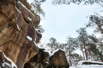 Fototapeta na wymiar Rock at winter resort in mountains