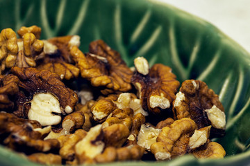 Shelled pecans in beautiful textured bowl