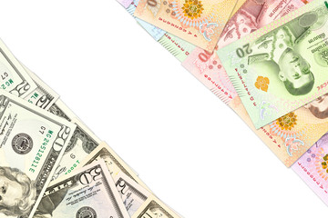 some thai baht and us-dollar banknotes indicating trade relations with copyspace