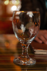wine glass in ambient environment beautiful reflections and bokeh 