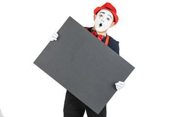 happy artist MIM is holding a black Board on a white background