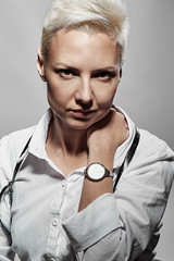 Beautiful girl in a shirt with short hair.