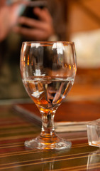 wine glass in ambient environment beautiful reflections and bokeh 