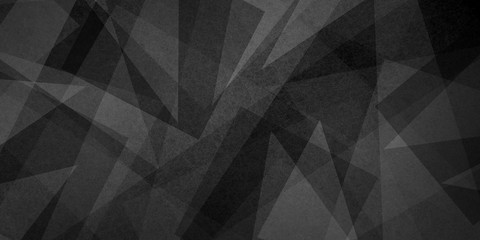 Fototapeta premium dark black and white abstract background with geometric triangle layer design with texture