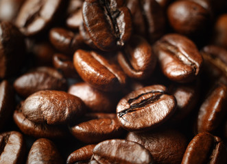 Roasted coffee beans close-up. Shallow depth of field. Selective focus.