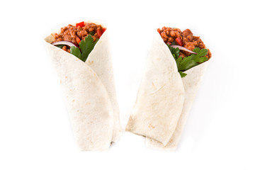 Typical Mexican burritos wraps with beef, frijoles and vegetables isolated on white background. Top view