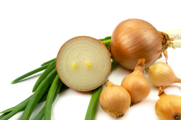 Close up of assorted fresh whole and halved onions