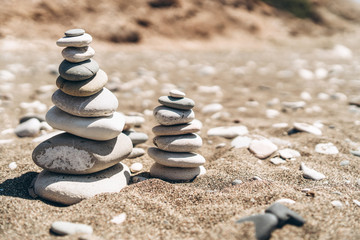 Fototapeta na wymiar Stack of sea stones on the beach.