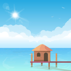 Beach bungalow standing in water. Ocean shore hotel hut. Wooden bungalow with ladder and ocean with clouds on background. Bright and big puffy clouds lying on the blue sea.