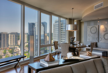Dining room with view in luxury highrise apartment