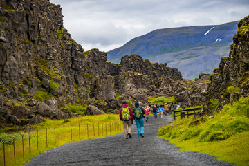 Thingvellir national park, Pingvallavatn huge tectonic plates drifting cracks and tourists on Iceland, summer time