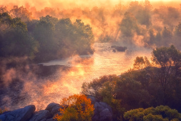 Amazing nature landscape, misty autumn sunrise over the scenic rocky canyon, National park Bugski Guard, Southern Bug river, Mykolaiv region, Ukraine