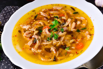 Traditional tripe soup in polish style with beef and vegetables