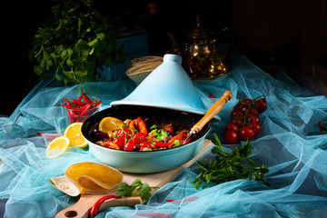 Tasty spicy beef with various vegetables cooked in tagine
