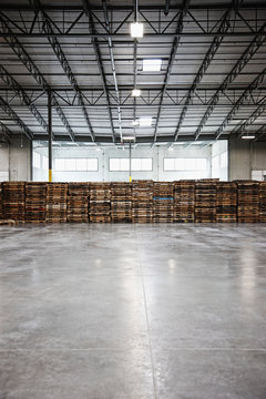 Pallets stacked in warehouse