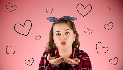 Pun-up woman blowing a kiss 