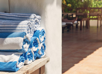 Blue towel on hotel background