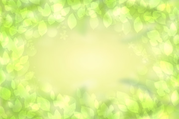 Green leaves background. Abstract fresh green leaves border on delicate green background. Beautiful spring and sunny summer backdrop texture. Space.